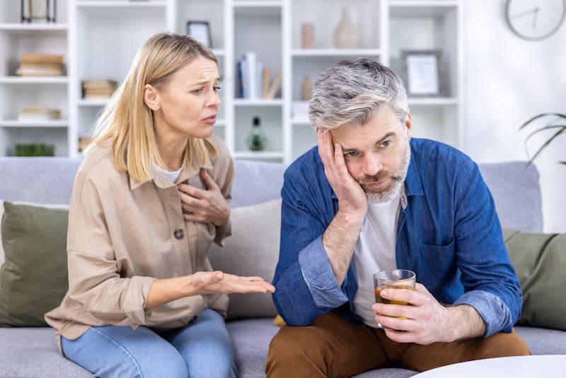 Couple in an emotionally tense moment, illustrating mistakes that keep unhealthy relationship patterns in place